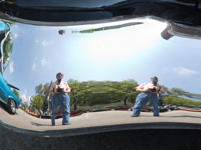 My two reflections are easy to see, but don`t miss my third head floating above the left reflection.