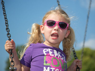 Today I learned a lot about being a daddy, like how to sit on a bench in the shade while mommy pushes the swing.