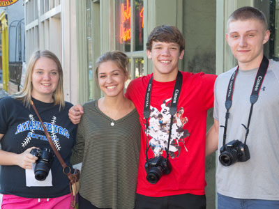 This morning a school bus deposited a couple dozen high school photographers in my neighborhood.