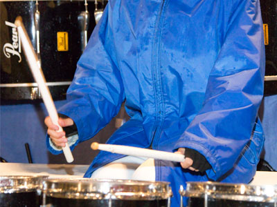 She had a poncho to protect her from the cold rain.  I just got wet.