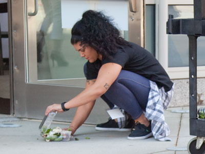 Ewww -- she lost her lunch on the sidewalk.