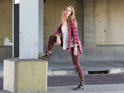 In her boots, she was taller than me.