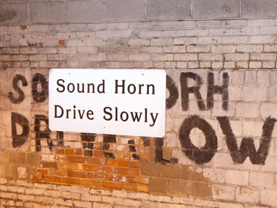 I don`t blow my horn, I just turn up the Van Halen.  And please ponder the spelling of the hand painted letters.