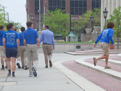 The teacher turns his back, and a high school senior slips away to begin summer vacation early.