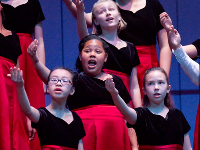 Even the youngest choir members are very disciplined.  They didn`t bring their hands down until the director did.