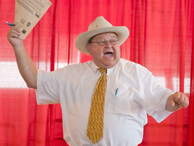 `SOLD!`  You`ll never know how many useless pictures I took at the livestock auction before this one came along.