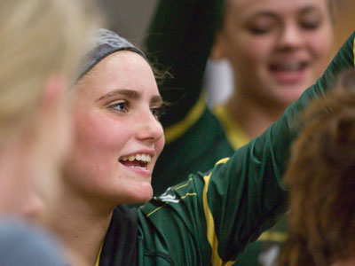 The faces in the other huddle weren`t so cheerful.