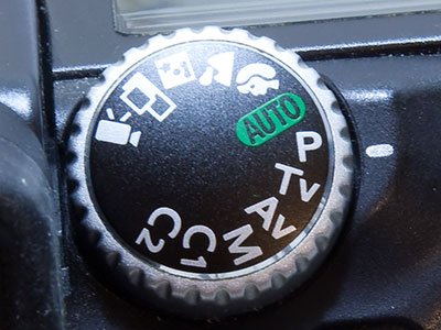 Program mode is just as bad as Auto.  Keep turning.