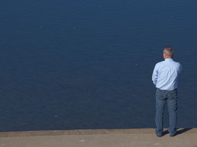 Waiting for his ship to come in.