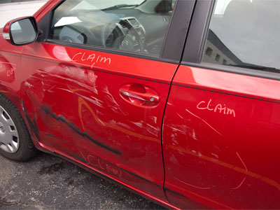 Now someone has been writing on my wrecked car.