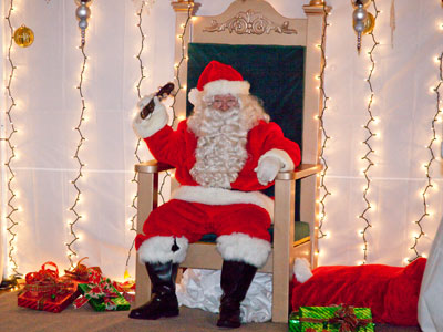 There was nobody on his lap and no one waiting in line.  Maybe people have caught on about Santa Claus.
