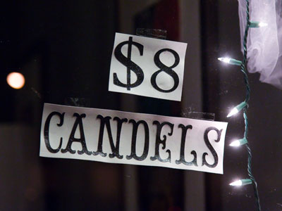 You`d think that . . . in a CANDLE SHOP . . . someone could spell candle.