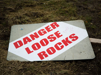 The rocks are no longer loose, so the sign isn`t needed.