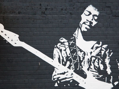 As two girls walked by, one of them said, `Chuck Berry.`