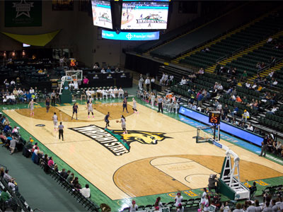 The university recently eliminated 23 employees, but is still able to operate this huge arena for a tiny audience.