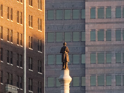 The metal man at Main and Monument.