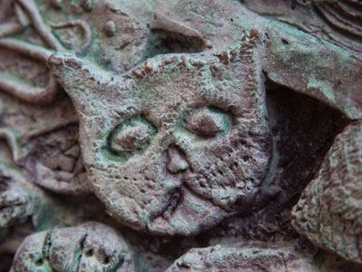 A cat made of bronze.  Don`t step on its hairballs.