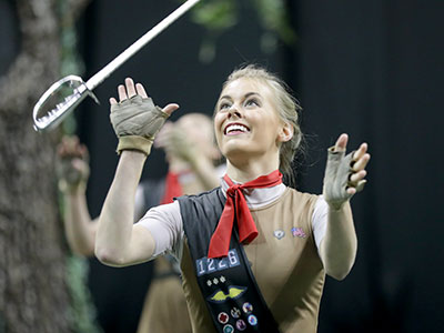 Unlike a typical sport, color guard shows tell a story, and they often have inspiring and challenging themes.