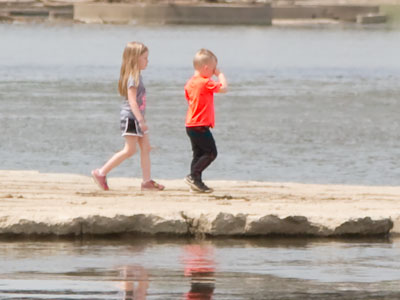 The kids asked, `Is this a ocean?`  Grandma said, `No, it`s a river.`