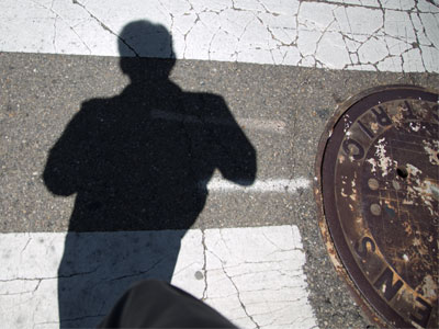 Man and manhole.