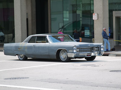 Old cars with Missouri plates are on the streets of Dayton as a Robert Redford movie is being filmed.