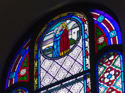 The stained glass is improved:  newer but less modern.