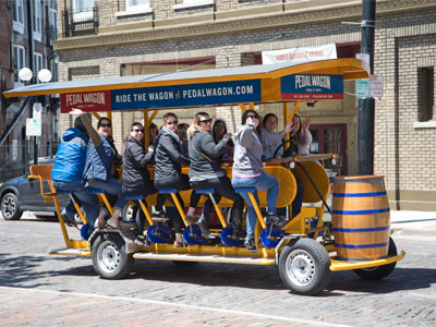 It`s a bar, on wheels.  Everyone is drinking, and driving.  Lumbering slowly through traffic using pedal power.