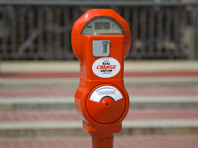 Instead of giving money to beggars, downtowners are asked to put it in these meters to bring Real Change.
