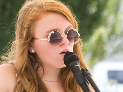 The glasses.  The red hair.