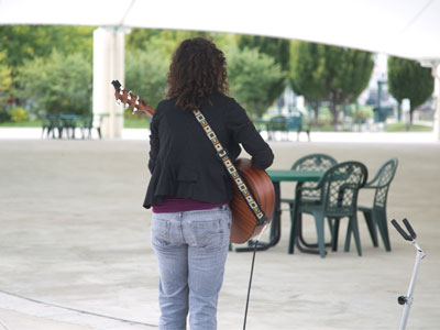 Singing her heart out to nobody.