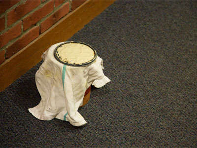 The painter asked for paper and a marker to make a `Wet Paint` sign.  Because the painter didn`t have one.