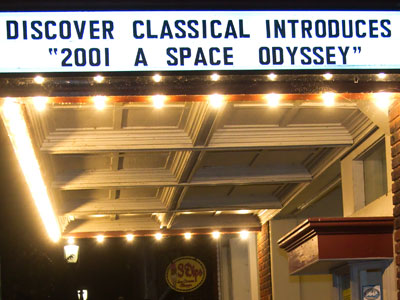 There was a bright marquee outside the theatre.