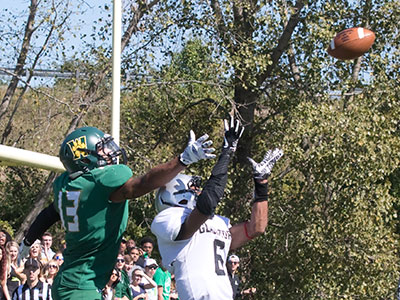 The ball is heading for the end zone . . . 