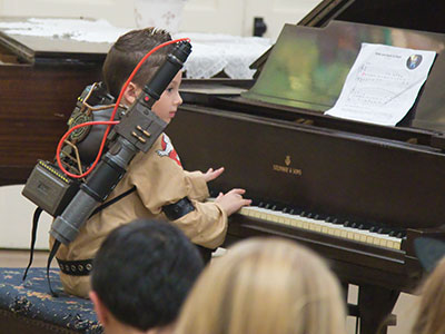 A junior Ghostbuster played a spooky song.