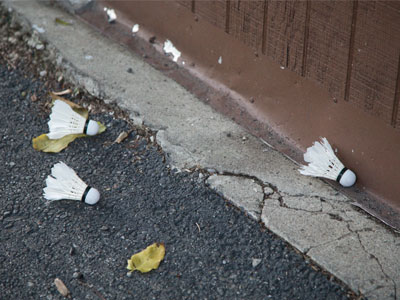 A man and his little boy were having fun playing badminton in an alley. His childhood memories will be much different than mine (see June 11, 2014).