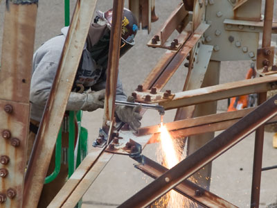 This structure was built to withstand an atomic blast, so it`s taking a long time to disassemble.