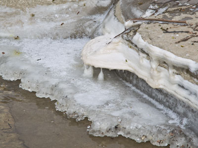 River water freezes at one temperature;  mysterious toxic sludge freezes at a different temperature.