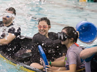Paddling around the WSU pool.