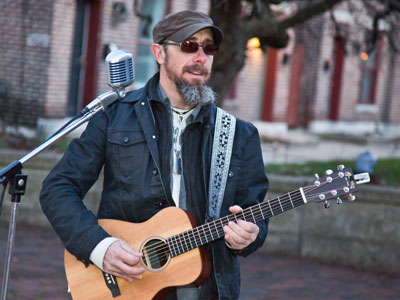 Every stop is neatly planned for a poet and a one-man band.  PAUL SIMON