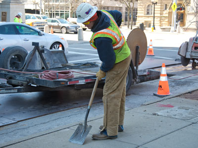 Posing for photos instead of working.