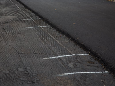 The street paving project is taking longer than expected.