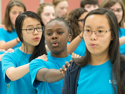 Warming up during rehearsal.