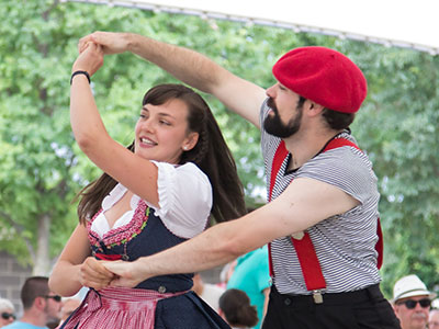 A German girl and French man do a Czech dance.