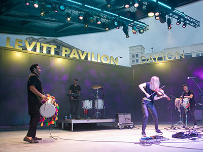 Delhi 2 Dublin plays Indian/Irish electronic dance music.