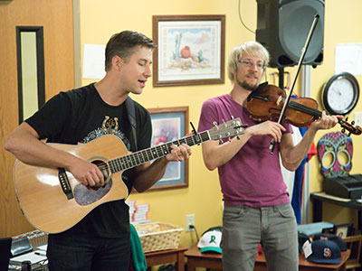 They spent the morning at a youth shelter where they gave a brief performance for a small group of residents.