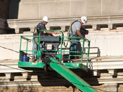 Meanwhile, across the street, a century-old building needs attention.