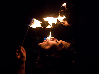 Kali the Courageous, visual and performance artist, entertains the crowd at the Oregon District Hauntfest.