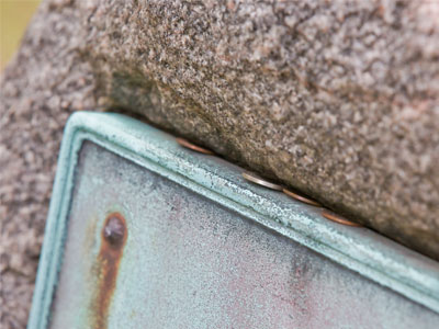 Coins left on Paul Laurence Dunbar`s grave.
