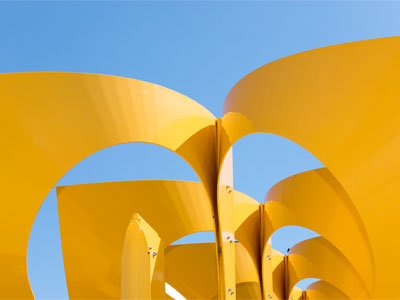 Fluid Dynamics by Jon Barlow Hudson, and a perfectly blue sky.