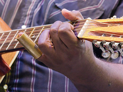 Taj Mahal once said of Alvin Youngblood Hart, `The boy has got thunder in his hands.`
